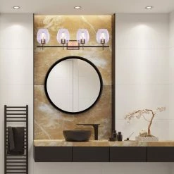 Cain 33.75 in. 4-Light Gold and Matte Black Vanity Light with Clear Glass Shade by CANARM -HINKLEY || CANARM Shop gold and matte black canarm vanity lighting ivl1019a04bkg 31 1000