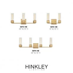 XANDER 32 in. 4-Lights Heritage Brass Vanity Light by HINKLEY 7 XANDER 32 in. 4-Lights Heritage Brass Vanity Light by HINKLEY -HINKLEY || CANARM Shop heritage brass hinkley vanity lighting 5974hb 1f 1000