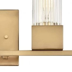 XANDER 32 in. 4-Lights Heritage Brass Vanity Light by HINKLEY 6 XANDER 32 in. 4-Lights Heritage Brass Vanity Light by HINKLEY -HINKLEY || CANARM Shop heritage brass hinkley vanity lighting 5974hb 4f 1000